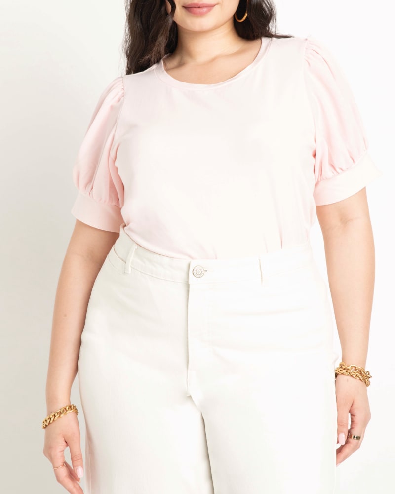 Front of a model wearing a size 14|16 Evelyn Combo Sleeve Tee in Blush by ELOQUII. | dia_product_style_image_id:204216